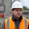 Anthony Bainbridge, civil engineer, in hi-vis onsite